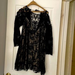 Free People beaded black dress. Size M